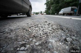 Дорога поселок Унъюган Коммунистический трещины в асфальте